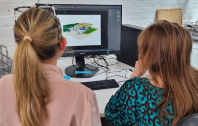 two people looking at a computer screen